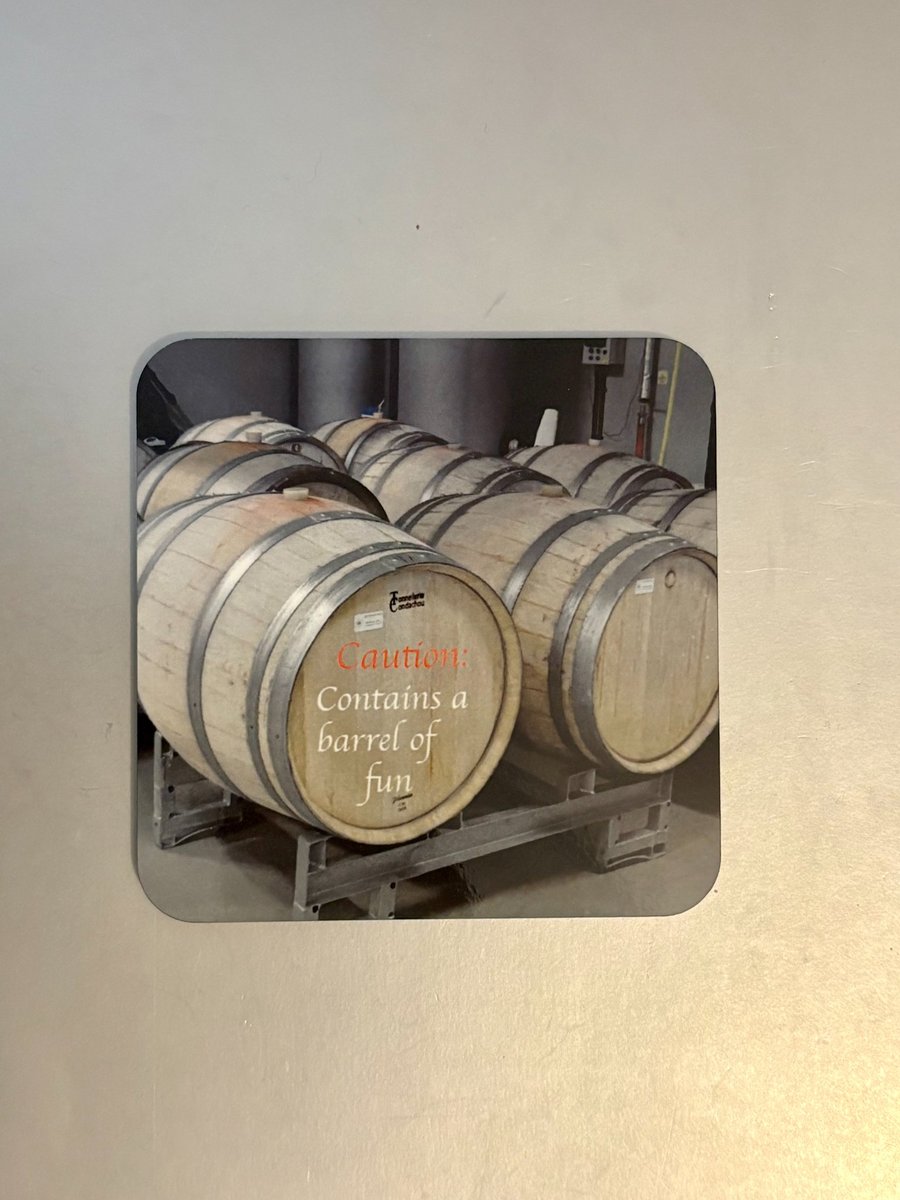 Contains a barrel...  9.5cm cork backed coaster 