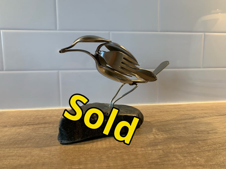 Stainless steel cutlery bird