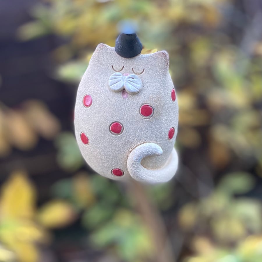 Spotty cat cane topper 
