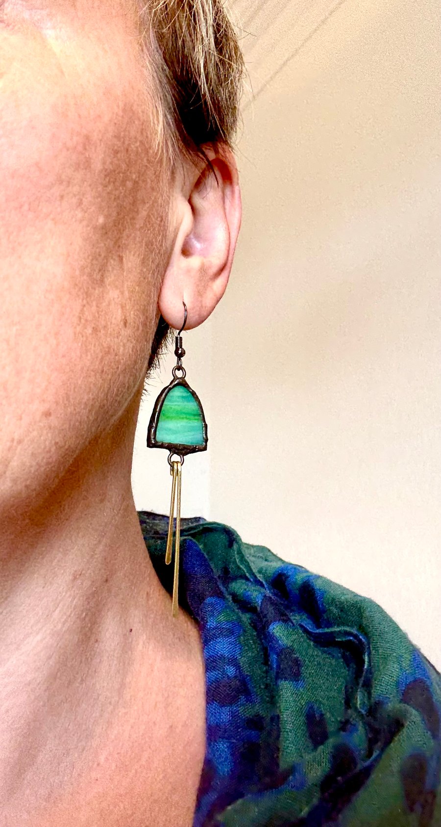 Statement Jewellery - streaky green stained glass earrings with hammered brass 