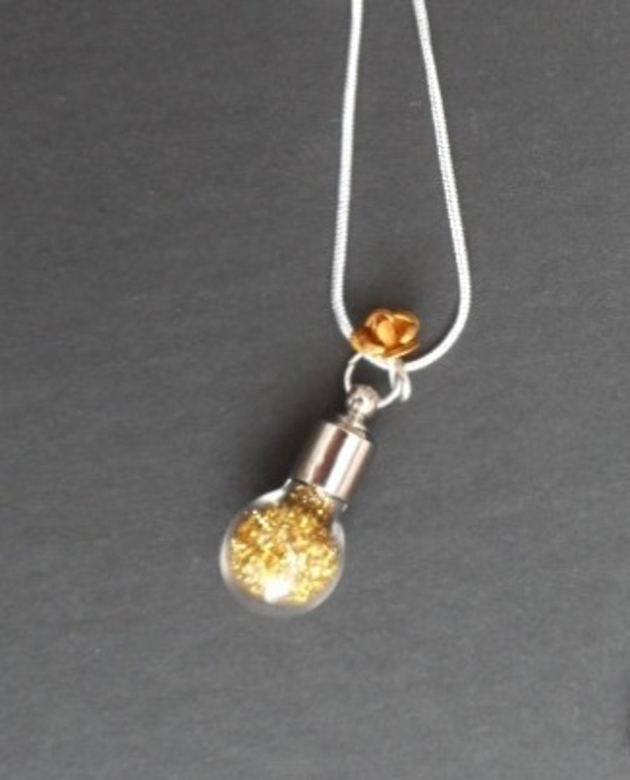 Glitter filled round glass vial necklace