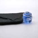 small glass jar of magic