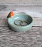 Very small ceramic ring dish with mini robin
