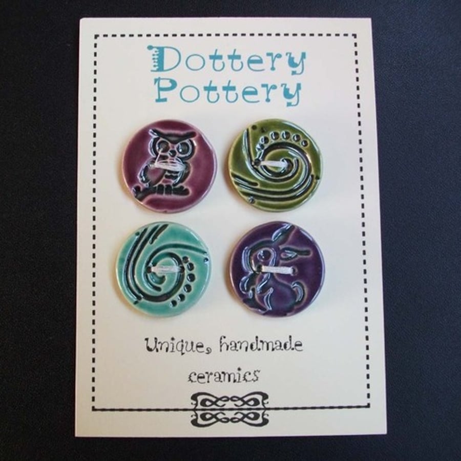 set of four large ceramic buttons