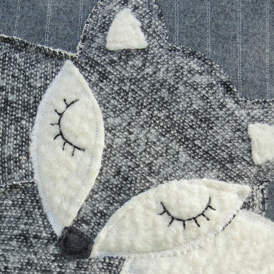 Fox cushion.  Half price.  A snoozy fox on grey pinstripe. With feather pad.