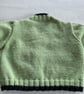 Green baby cardigan with sheep designs on the front - Image 7