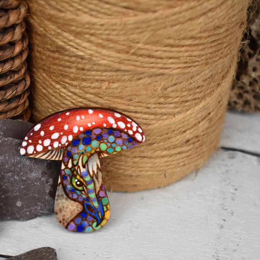 Pyrography dragon toadstool brooch. Hand burned shroom jewellery.