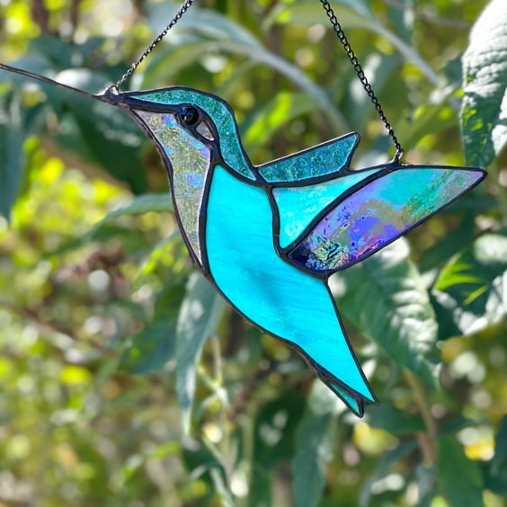 Stained Glass hummingbird in iridescent blue colours