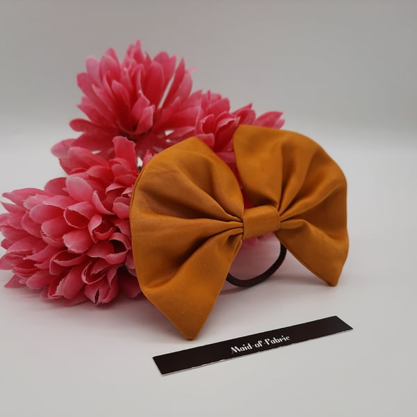Hair bobble bow in gold fabric. 3 for 2 offer.  