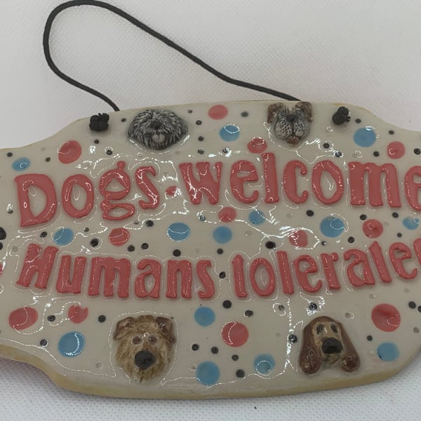 Humorous welcome sign  for dog lovers