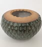 Green glazed stoneware decorative bowl.