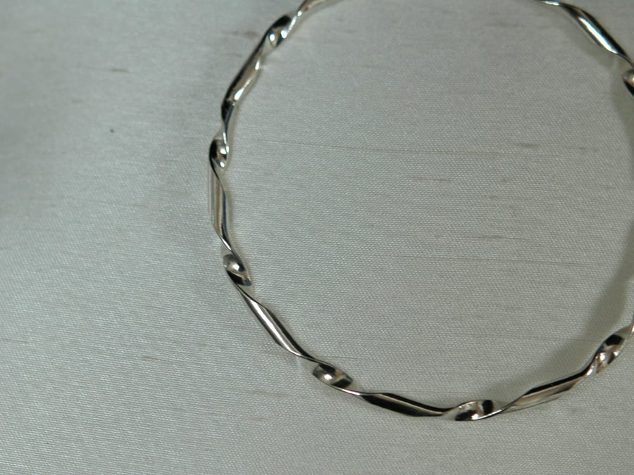 Twisted sterling silver D-wire bangle bracelet, hallmarked,   B79