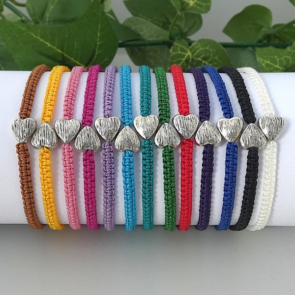 Macramé bracelet with silver plated heart charm, 13 colour options. Ref:326