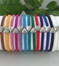 Macramé bracelet with silver plated heart charm, 13 colour options. Ref:326