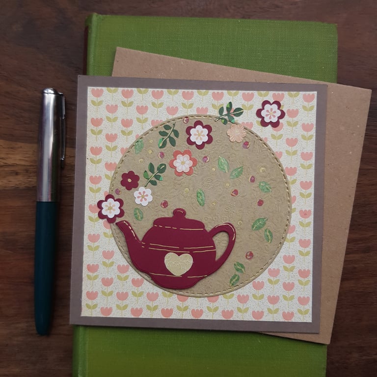 Handmade card, keepsake with dark red teapot and flowers on a tulip background 