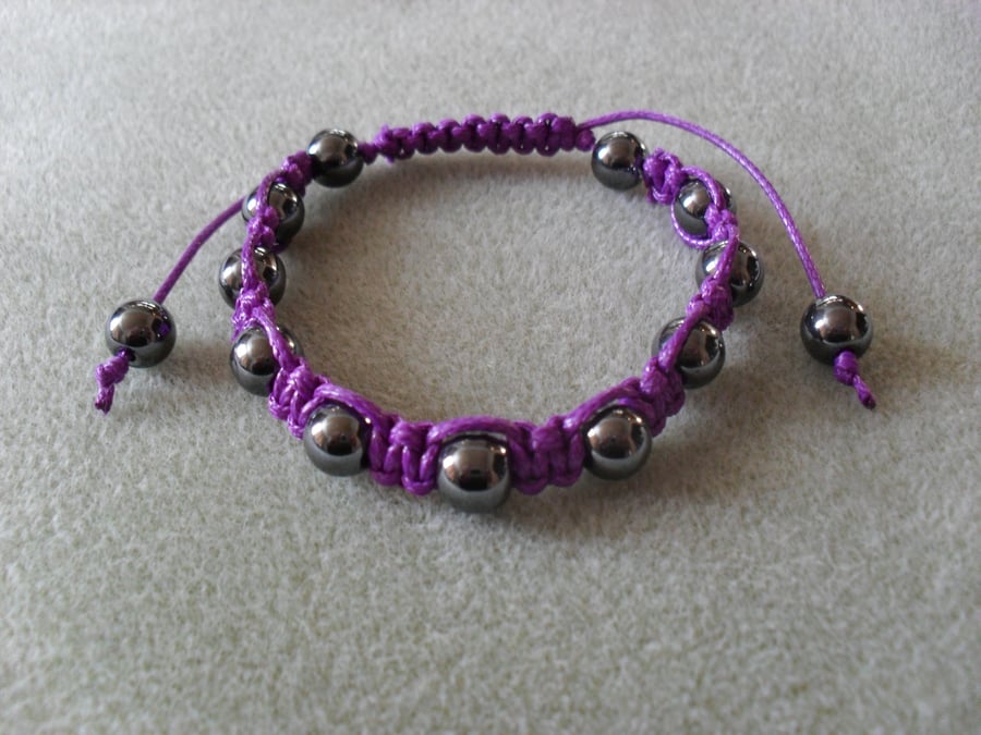  Haematite and purple cotton Macrame Bracelet