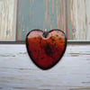 Heart shaped ‘lava’ pendant in enamelled copper 250
