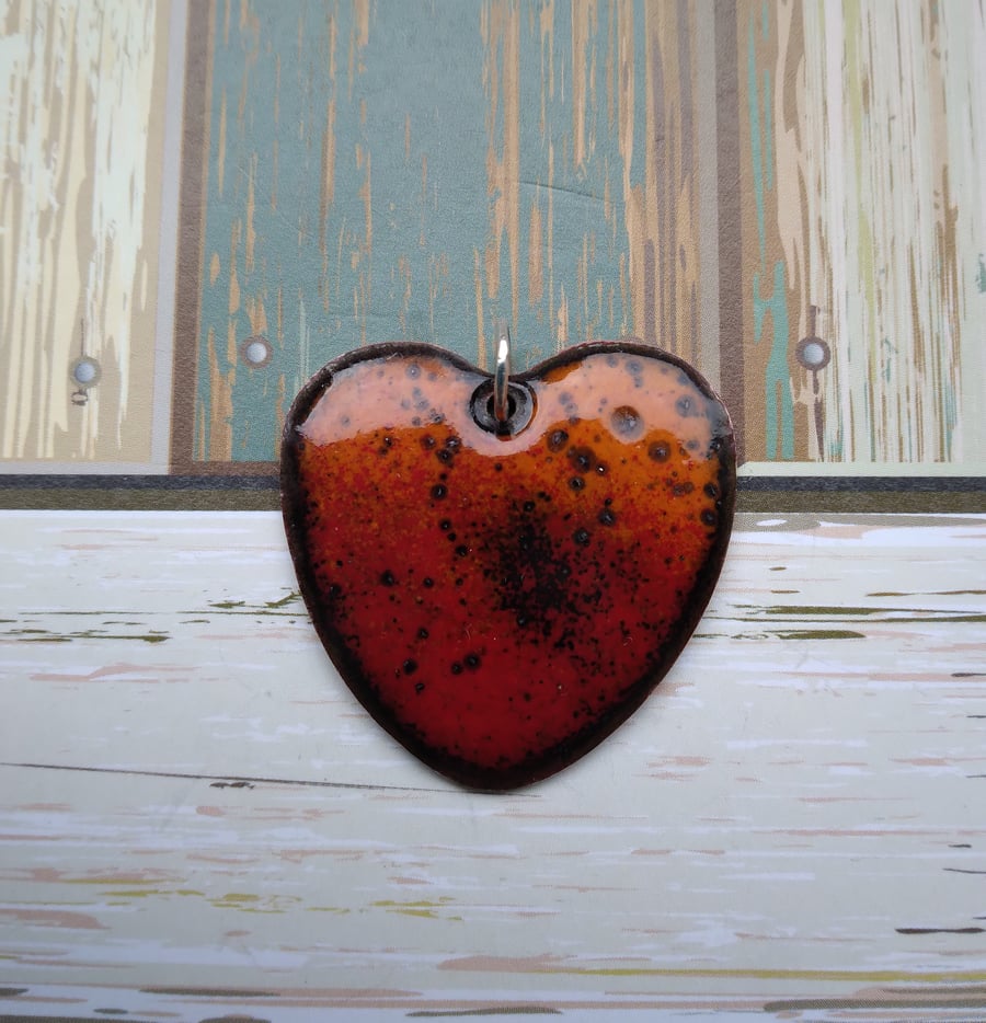 Heart shaped ‘lava’ pendant in enamelled copper 250