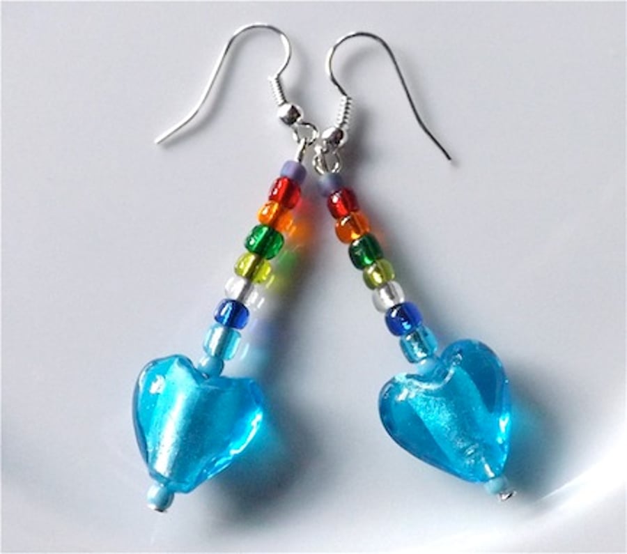 Rainbow dangles earrings for pierced ears, azur blue lampwork heart.