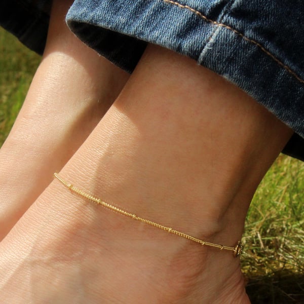 Gold satellite ankle bracelet