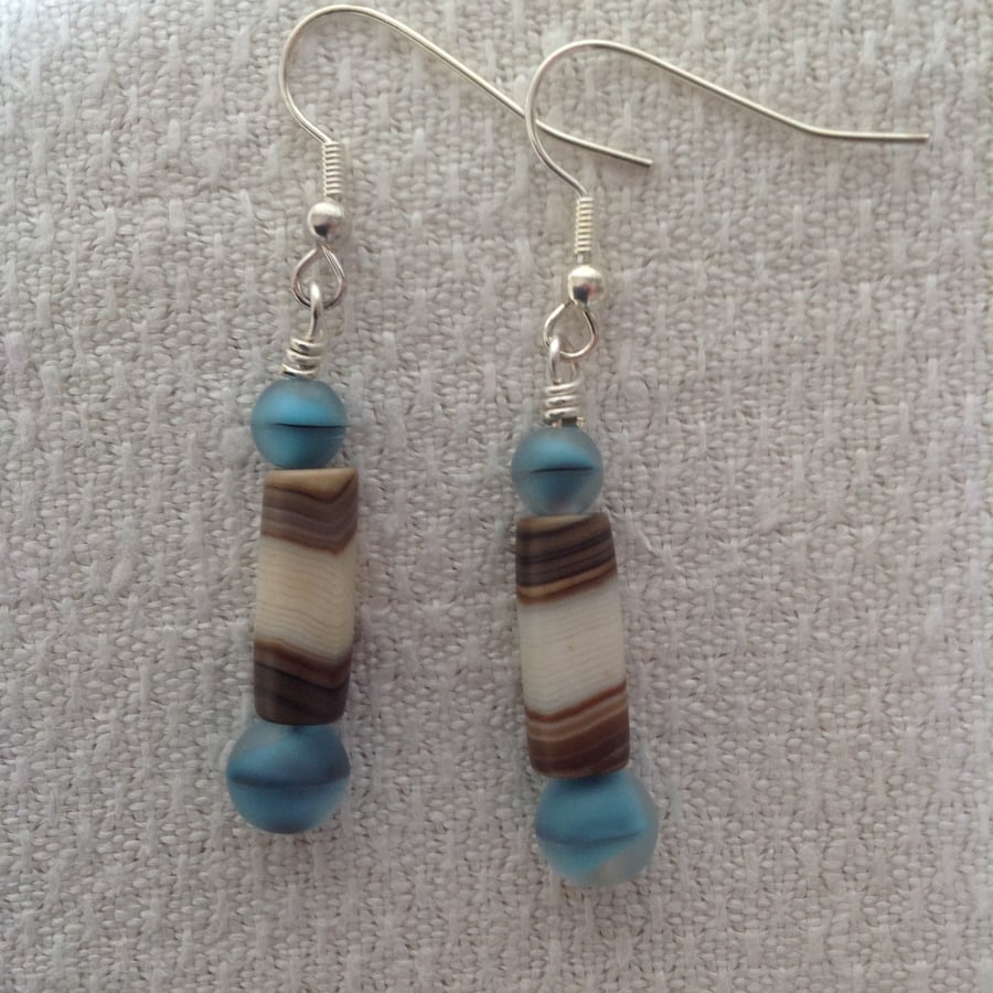 Ivory, brown and blue coloured bead earrings