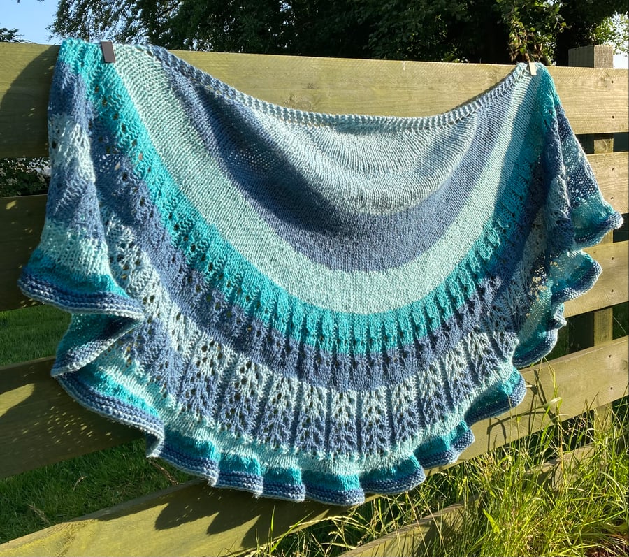 Hand knitted Crescent Lace Shawl in blues
