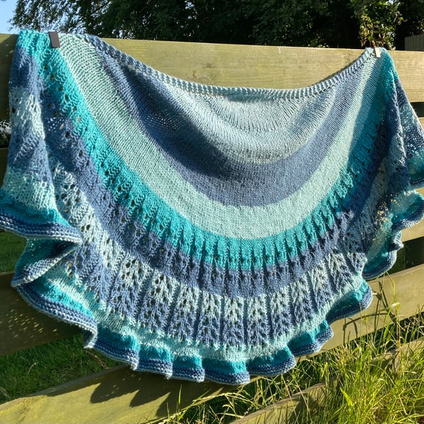 Hand knitted Crescent Lace Shawl in blues