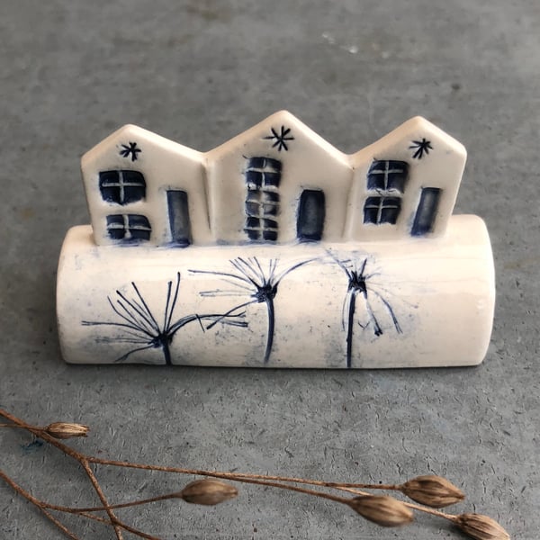 Ceramic row of little houses. 