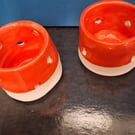 Two unique ceramic hand made tea light holders made with care and above all love