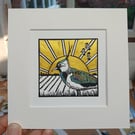 Peewit - original, hand painted, mounted linocut print of a lapwing at sunset