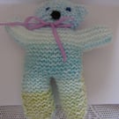 Pretty hand knitted teddy bear