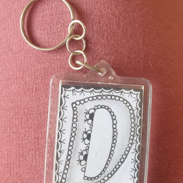 Hand drawn initial "D" keyring.