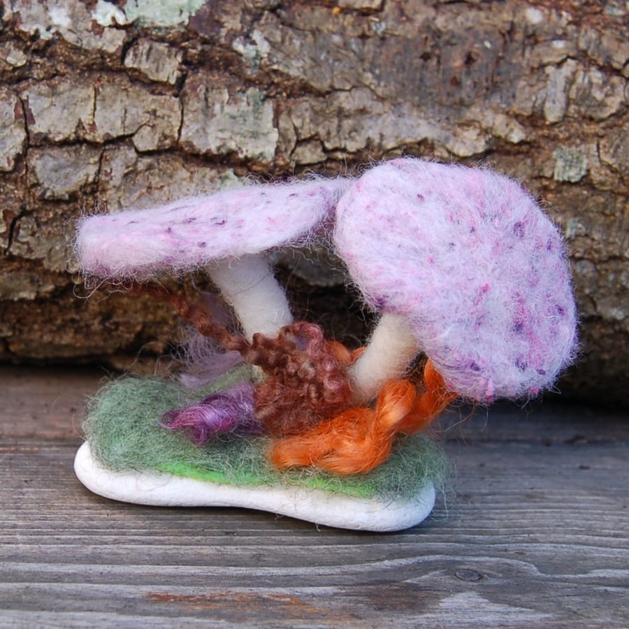 Mushroom decoration, needle felt mushrooms attached to a found pebble