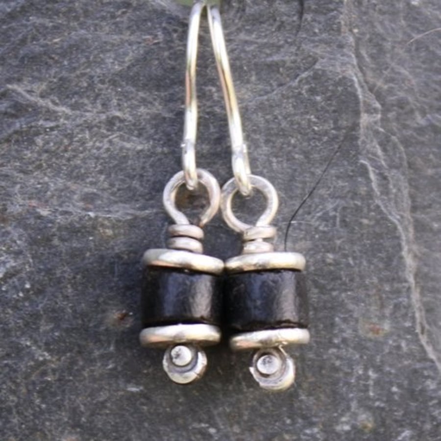 Reels - silver and black coral earrings