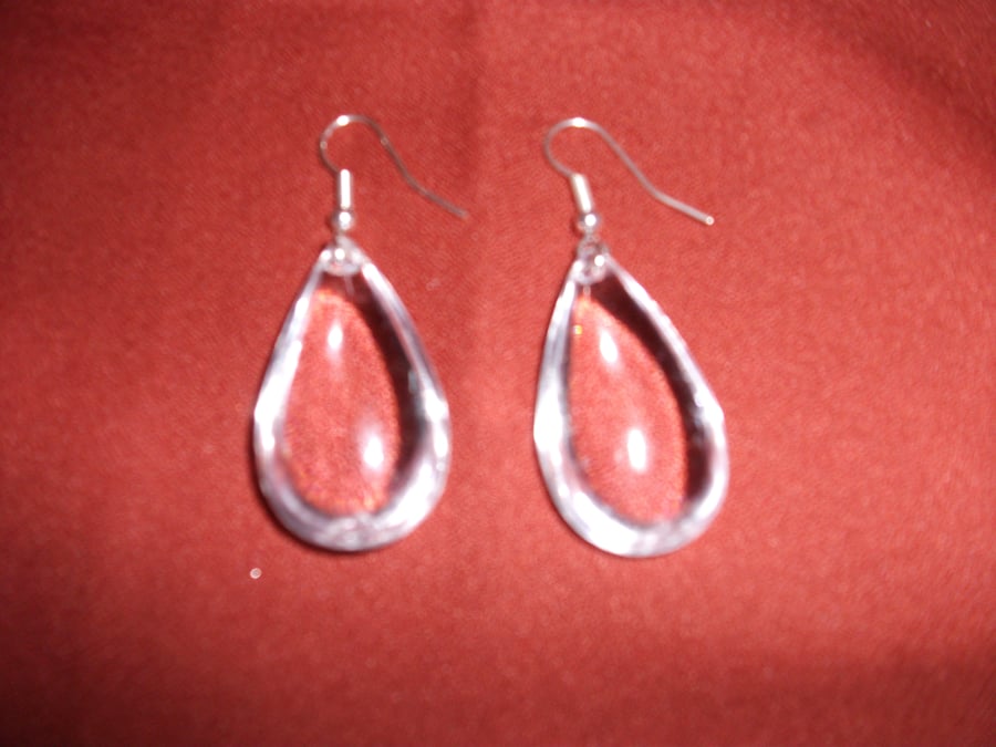 Clear Pear Drop shaped earrings with silver plate earwires.