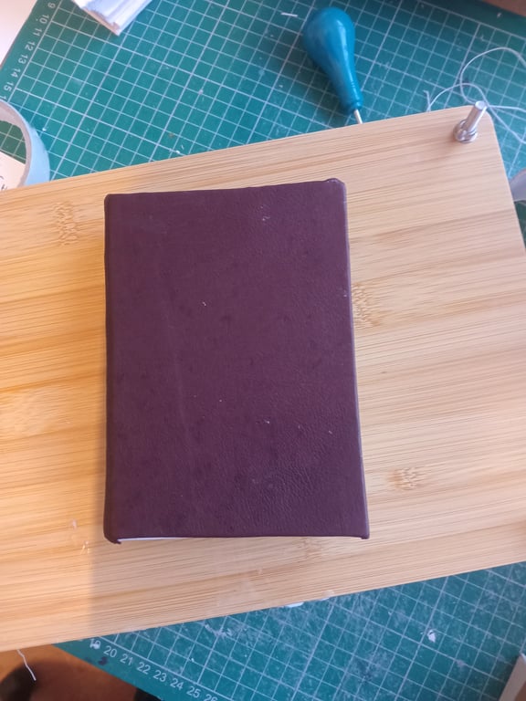 Brown leather small journal or notebook with blank white drawing paper 