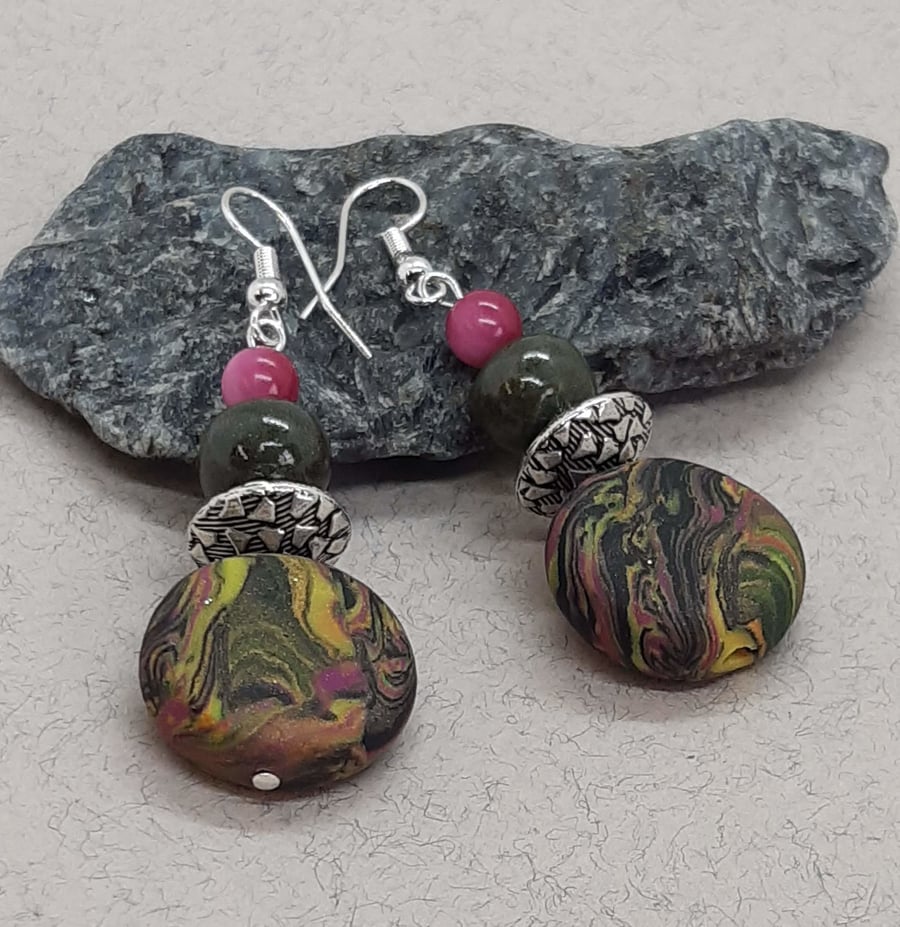 Colourful polymer clay disc shaped earrings