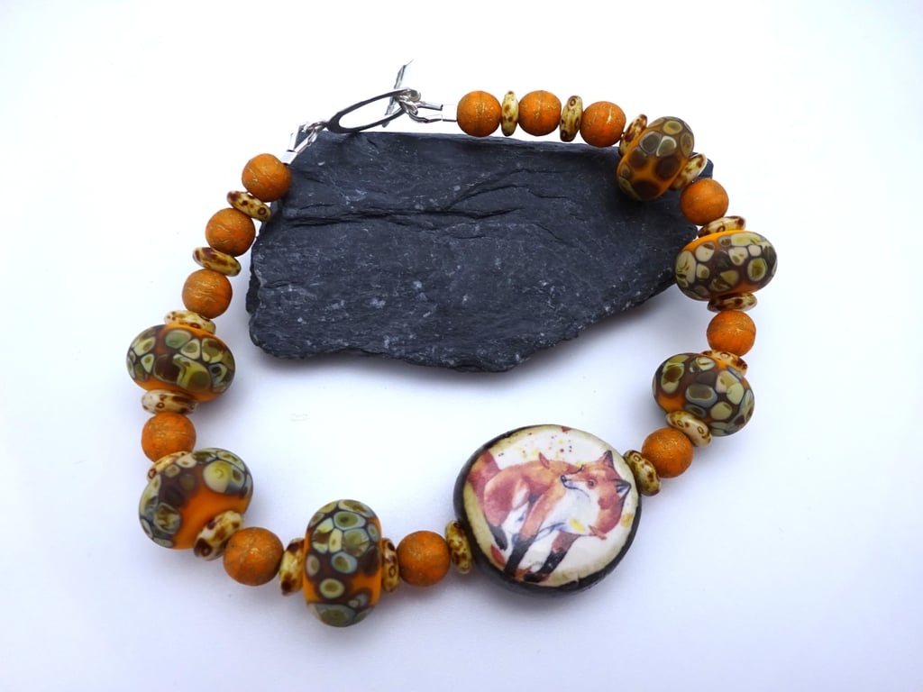 orange lampwork glass ceramic fox bracelet