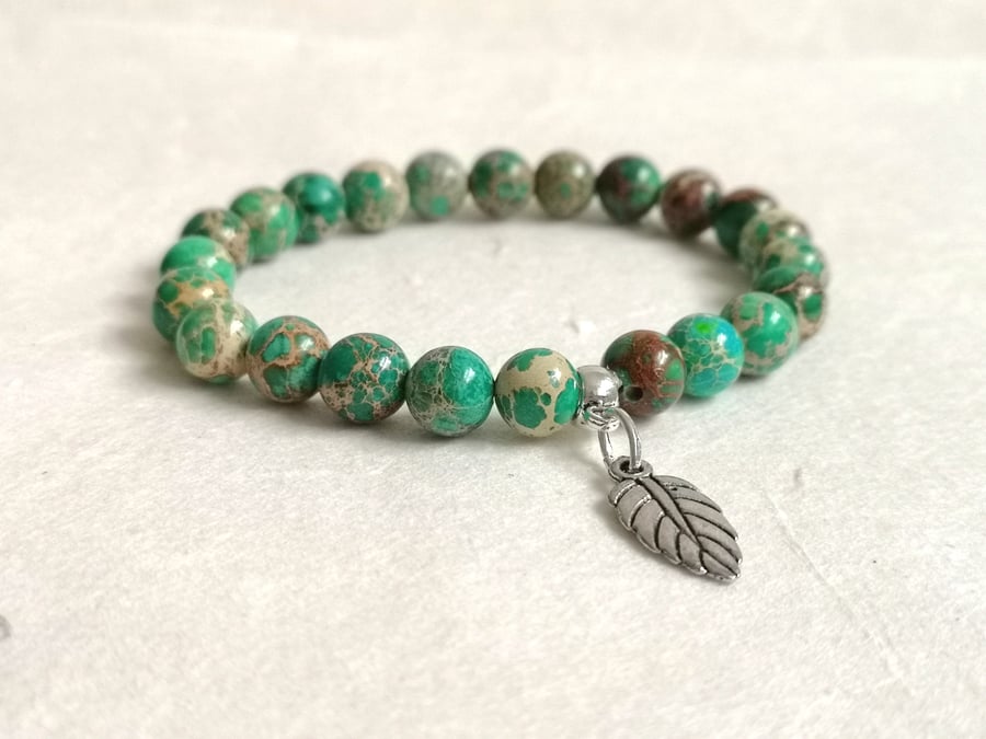 Green jasper semi precious stretchy bracelet with leaf charm