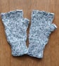 Knitted handmade green and white patterned fingerless gloves - Image 1