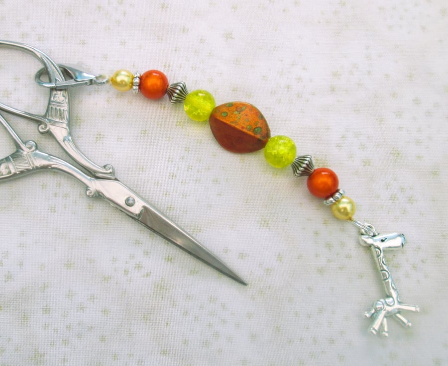 Yellow and orange scissor fob with giraffe charm, bag charm or zipper pull