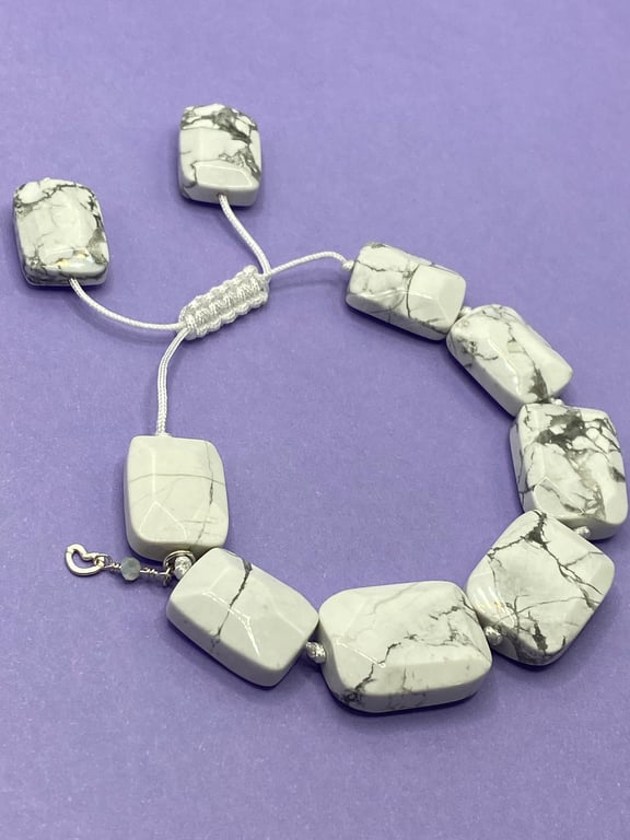 Knotted white cord bracelet with rectangular howlite stones 