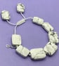Knotted white cord bracelet with rectangular howlite stones  - Image 1