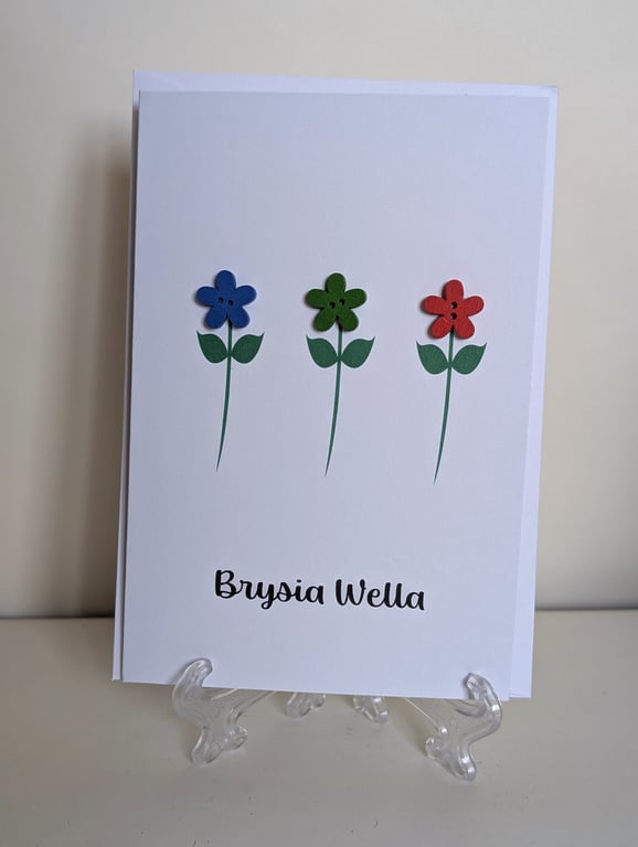 Brysia Wella Get Well Soon greetings card in Welsh with flower buttons 