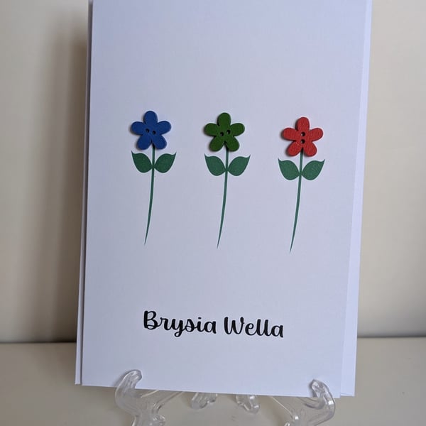 Brysia Wella Get Well Soon greetings card in Welsh with flower buttons 