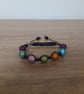 BLACK AND MULTI COLOURED MACRAME BRACELET. - Image 2