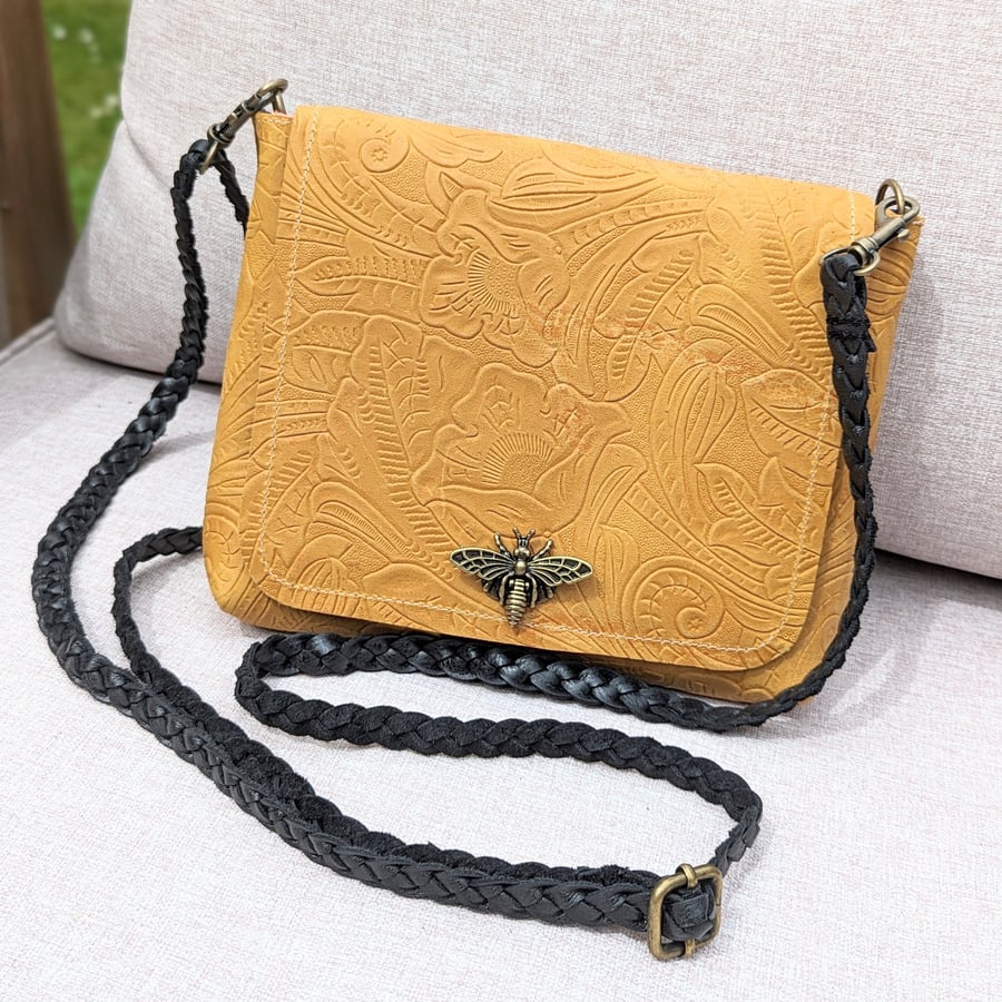 Small leather bag with bee clasp made with yellow embossed leather 