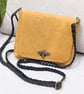 Small leather bag with bee clasp made with yellow embossed leather 