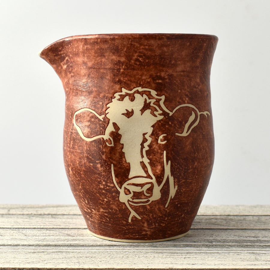 A78 - Ceramic jug with cow  (Free UK postage)