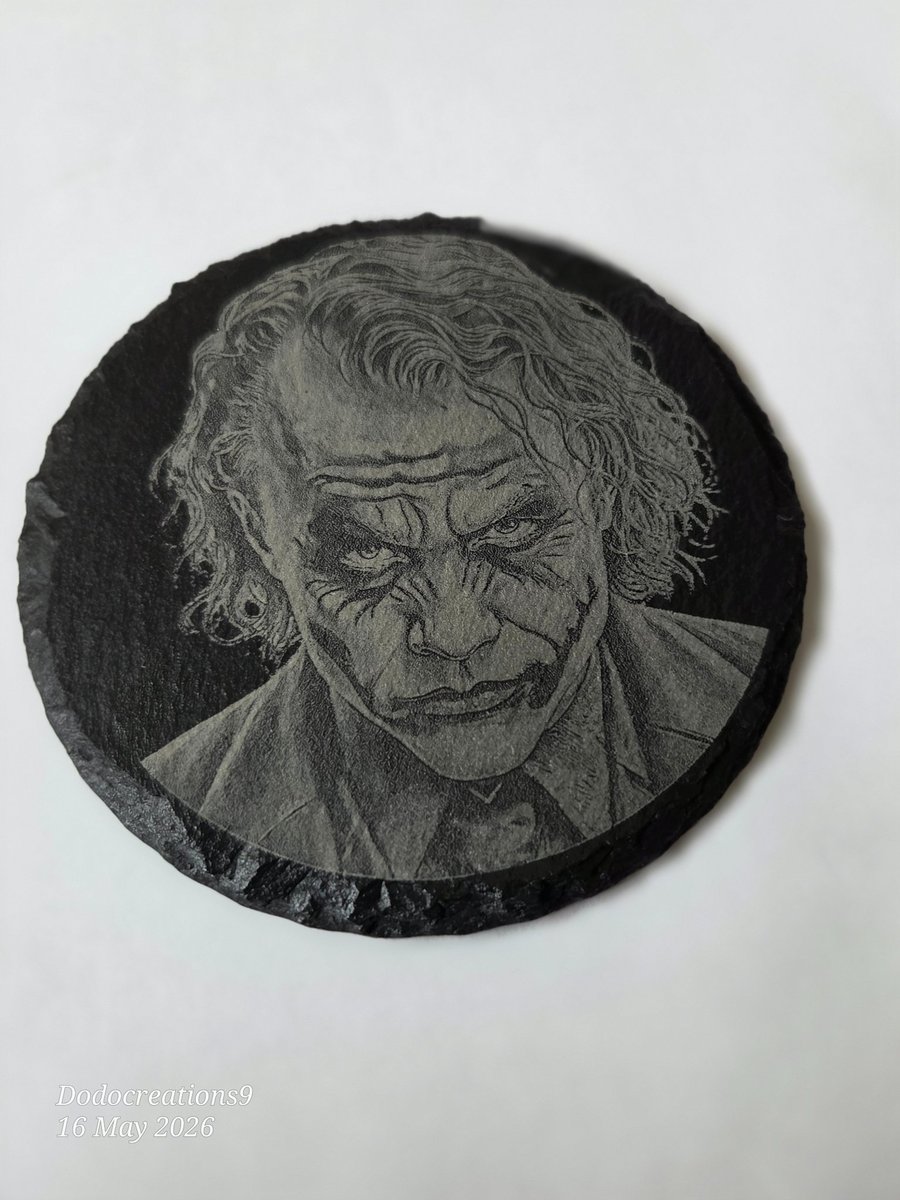 The Joker on a slate coaster 